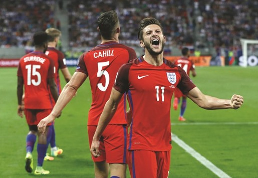 Englandu2019s Adam Lallana celebrates scoring against Slovakia during their 2018 World Cup Qualifying European Zone, Group F, match at the City Arena, Trnava, Slovakia.
