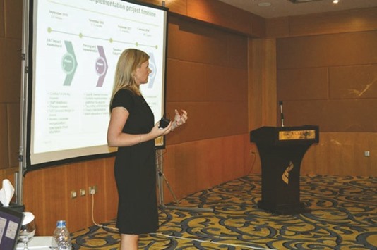 E&Y Qatar tax director Jennifer O Sullivan delivering a presentation on value added tax in the GCC.