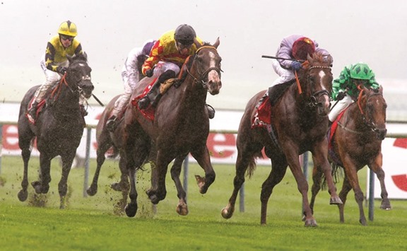 Frankie Dettori (second left) rides Hathal to victory in the Superior Mile (Gr3) at Haydock on Saturday. PICTURE: Racingfotos