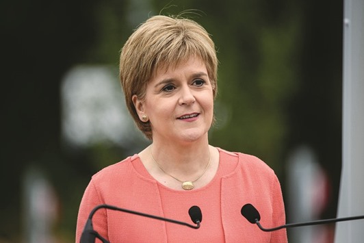 In this file picture taken on September 9, 2015, Scotlandu2019s First Minister Nicola Sturgeon speaks at Tweedbank Station on the Scottish Borders. Scotlandu2019s First Minister on Friday warned that a united Britain was u201con borrowed timeu201d unless Prime Minister David Cameron devolved more powers to Edinburgh, on the first anniversary of a historic independence referendum.