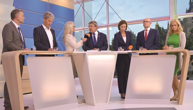 (From left) Leif-Erik Holm, the top candidate of the AfD; Helmut Holter, the top candidate of the Linke; Lorenz Caffier, the top candidate of the CDU; Erwin Sellering, the Mecklenburg-Vorpommern state premier and the top candidate of the Social Democratic Party; and the top candidate of the Green party, Silke Gajek, attend a post-election TV debate after exit polls were announced. Germanyu2019s anti-migrant populists AfD recorded strong results of around 21% at state elections yesterday, unseating Chancellor Angela Merkelu2019s CDU party from second place, exit polls showed.
