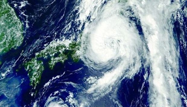 A Nasa satellite image shows Typhoon Mindulle over Japan last month.