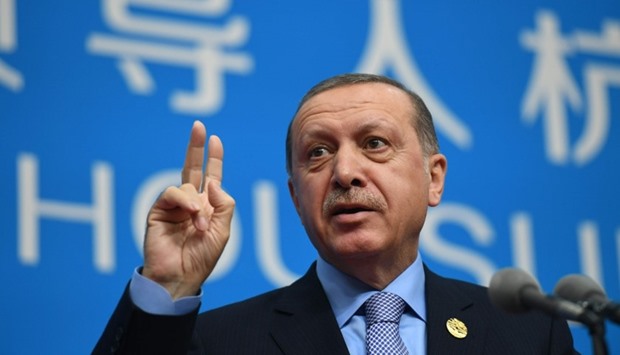 Turkey's President Recep Tayyip Erdogan speaks on the sidelines of the G20 Summit in Hangzhou.