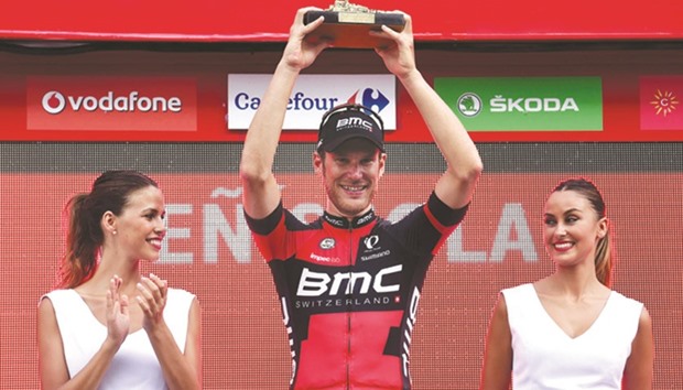 BMC Racing Teamu2019s Luxembourgian cyclist Jean-Pierre Drucker celebrates on the podium after winning the 16th stage of the 71st edition of u2018La Vueltau2019 Tour of Spain, a 158km route Alcaniz to Peniscola. (AFP)