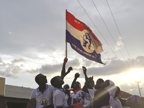 Supporters of Ghanau2019s opposition New Patriotic Party rally ahead of a speech by party leader Nana Akufo-Addo in Salaga.