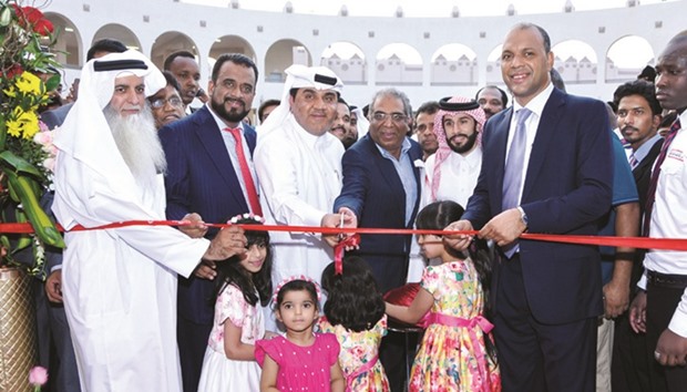 Ezdan Holding Group CEO Ali Mohamed al-Obaidli inaugurating Grand Hypermarket in Ezdan Mall, Al Wukair, in the presence of officials of Grand Mall and Regency Group.