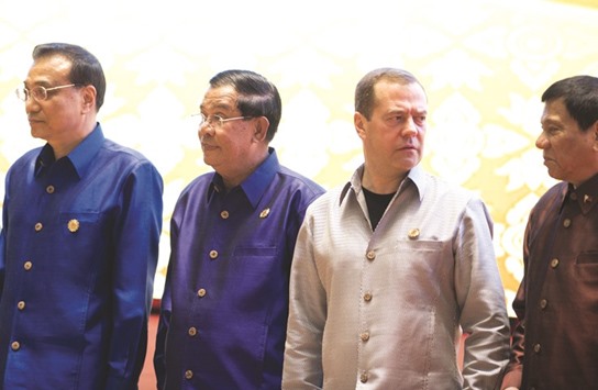 (From left) Chinau2019s Premier Li Keqiang, Cambodiau2019s Prime Minister Hun Sen, Russian Prime Minister Dmitry Medvedev and Philippines President Rodrigo Duterte attend the gala dinner during the second day of the Association of Southeast Asian Nations (Asean) Summit in Vientiane yesterday.