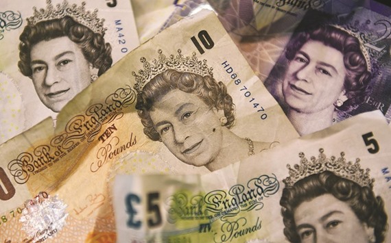 A close-up of a mixture of British five, ten and twenty pound notes in London. The currency dived yesterday following a recent rally, as traders fretted over mixed data in the wake of Britainu2019s EU exit vote in June.