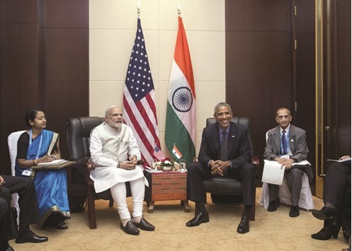 US President Barack Obama meets Prime Minister Narendra Modi on the sidelines of the East Asia summit in Vientiane yesterday.