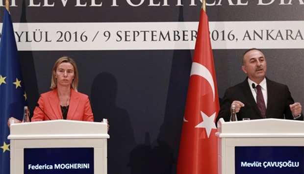 Turkish Foreign Minister Mevlut Cavusoglu (R) and High Representative of the European Union for Foreign Affairs and Security Policy and Vice-President of the European Commission, Federica Mogherini (L)