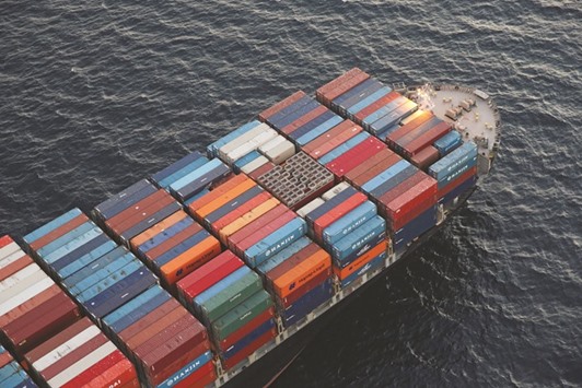 A Hanjin Shipping vessel is seen stranded outside the Port of Long Beach, California. Around $14bn of cargo has been tied up globally as ports, tug boat operators and cargo handling firms refuse to work for Hanjin because they fear they will not be paid.