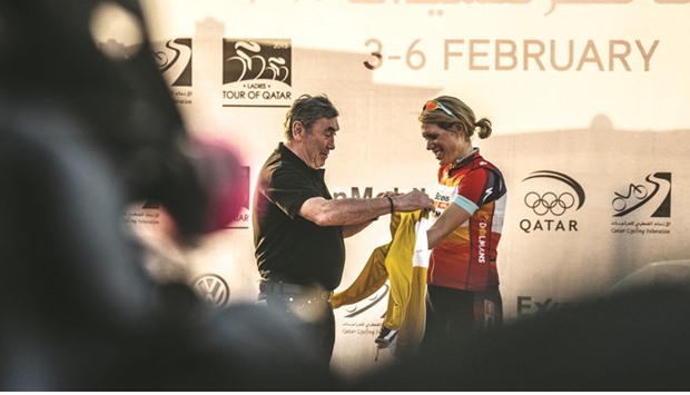 Belgian cycling legend Eddy Merckx (left) on the podium for the 2015 Ladies Tour of Qatar.
