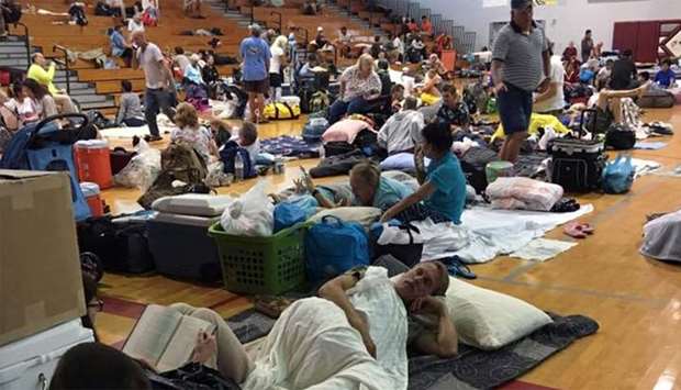 People take shelter at Key West High School in Key West, Florida