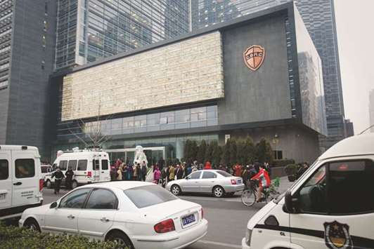 The China Banking Regulatory Commission headquarters in Beijing. As a flood of unregulated cash swirls through the Chinese economy, Beijing has been taking aim at the trust companies whose unrestrained lending practices are worrying regulators like the CBRC.