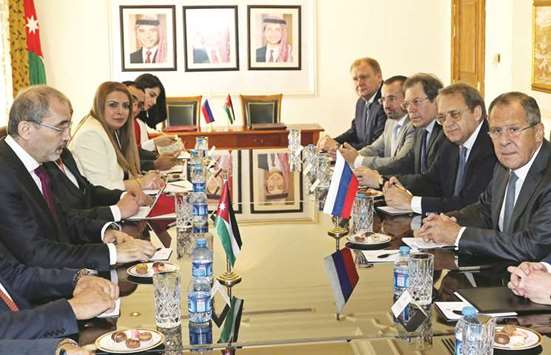 Russian Foreign Minister Sergei Lavrov (right) meets with his Jordanian counterpart Ayman al-Safadi at the Foreign Ministry in Amman yesterday.