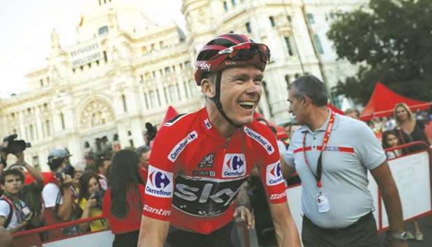 Team Sky rider Chris Froome reacts at the end of the last stage of Vuelta a Espana in Madrid, Spain, on Sunday. (Reuters)