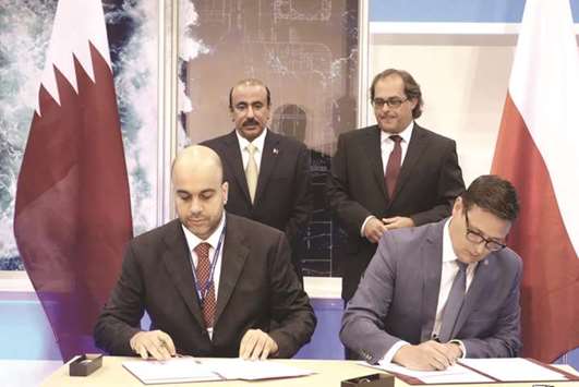 HE the Minister of Transport and Communications Jassim Seif Ahmed al-Sulaiti and Polandu2019s Minister of Marine Economy and Inland Waterways Marek Gr?barczyk witness Mwani Qatar CEO Captain Abdulla al-Khanji and Port of Gdansk Authorityu2019s board president and managing director Lukasz Greinke sign the memorandum of co-operation yesterday in Gda?sk, Poland.