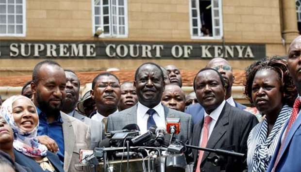 Kenyan opposition leader Raila Odinga speaks outside the Supreme Court after President Uhuru Kenyatta's election win was declared invalid, in Nairobi on Friday.