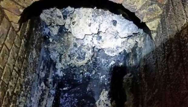 One of the biggest 'fatbergs' ever seen in Britain is seen in an image handed out by Thames Water in London on Tuesday.