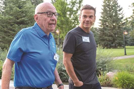 Rupert Murdoch (left) and Lachlan Murdoch, co-chairmen of  21st Century Fox, arrive for a morning session during a conference in Sun Valley, Idaho, US on July 13. UK Culture Secretary Karen Bradley is inclined to ask the Competition and Markets Authority to investigate Foxu2019s commitment to broadcasting standards, as well as whether its bid for pay-TV broadcaster Sky would give the Murdochs too much influence over UK media, she said in Parliament yesterday.