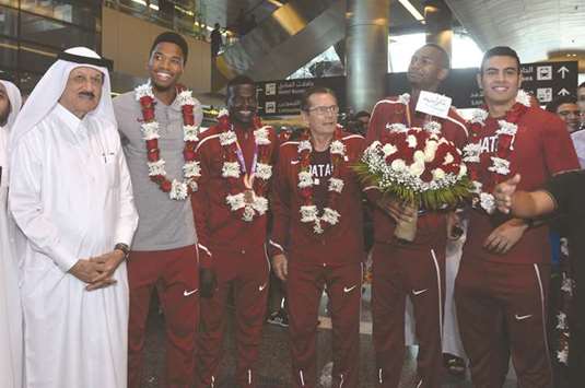 (From left) Former athletics and swimming official Yousuf al-Saie, 400m hurdles athlete Abderrahman Samba, 400m runner and 2017 World Championships bronze medallist Abdalelah Haroun, high jump coach Stanislaw Szczyrba, high jump world champion Mutaz Barshim and javelin thrower Ahmed Bader at Hamad International Airport in Doha yesterday. PICTURE: Noushad Thekkayil