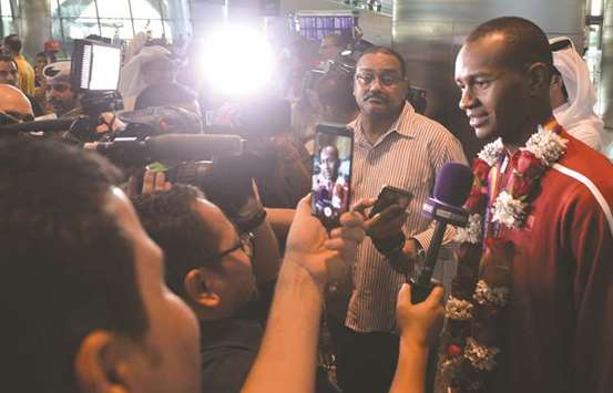 Barshim speaks to the media after his arrival in Doha yesterday. PICTURE: Noushad Thekkayil