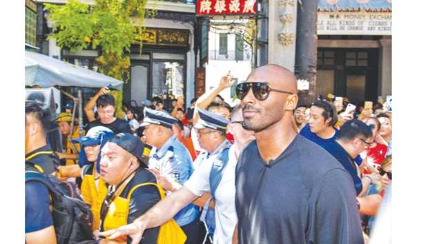 Former NBA basketball player Kobe Bryant attends a basketball teaching activity in Haikou, China. (AFP)