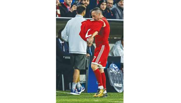 Bayern Munichu2019s Franck Ribery takes off his jersey after leaving the pitch during the Champions League match against Anderlecht in Munich on Tuesday. (AFP)