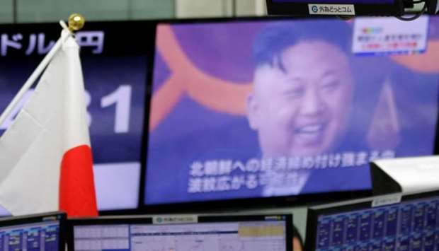 Monitors showing TV news on North Korea's threat