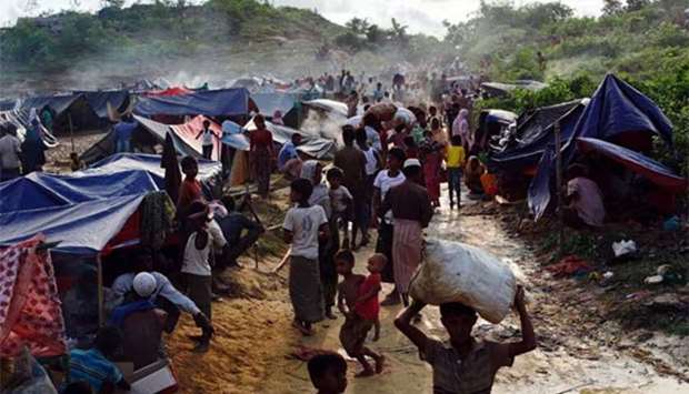 Rohingya refugees are seen at Thaingkhali makeshift refugee camp in Cox's Bazar, Bangladesh, on Thursday.