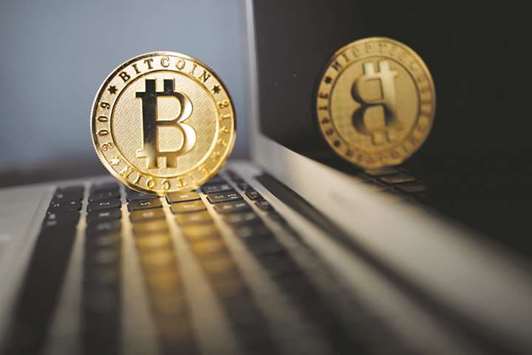 A Bitcoin (virtual currency) coin is seen in an illustration. The international value of bitcoin has plunged in recent days amid speculation that the Chinese authorities will shut down the trading platforms following last weeku2019s ban on initial coin offerings.