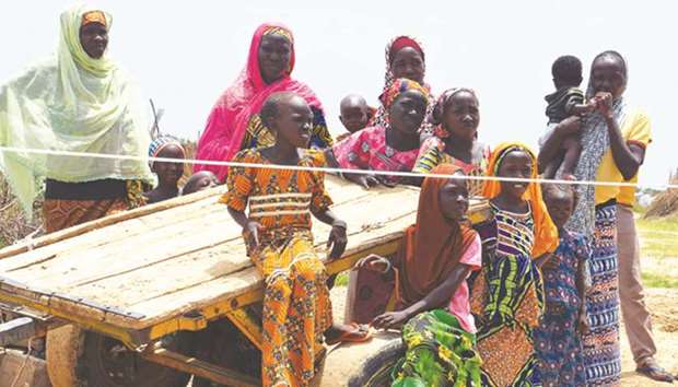 A picture taken on September 10 shows Nigerians at a UN camp for refugees and internally displaced persons (IDP) in NGagam, some 50km from Diffa, southeast Niger, close to the Nigerian border. Some 7,000 Nigerian refugees and 5,500 Nigerien IDPs are living the vast shantytown due to actions in the region by the Boko Haram group.