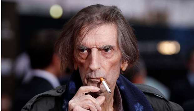 Harry Dean Stanton smokes a cigarette as he poses at the world premiere of the film ,Marvel's The Avengers, in Hollywood, California, US on April 11, 2012