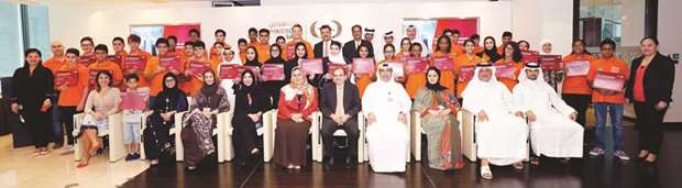 Officials with participants in the programme.