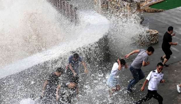 people reacting as a wave, caused by Typhoon Talim
