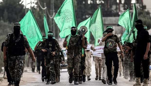 Masked youth cadets from the armed wing of the Palestinian Hamas movement