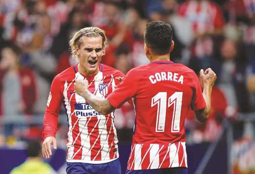 Antoine Griezmann (left) ensured Malaga didnu2019t spoil Atletico Madridu2019s moving in party at their new 68,000 Wanda Metropolitano stadium with the only goal in a 1-0 win. (AFP )