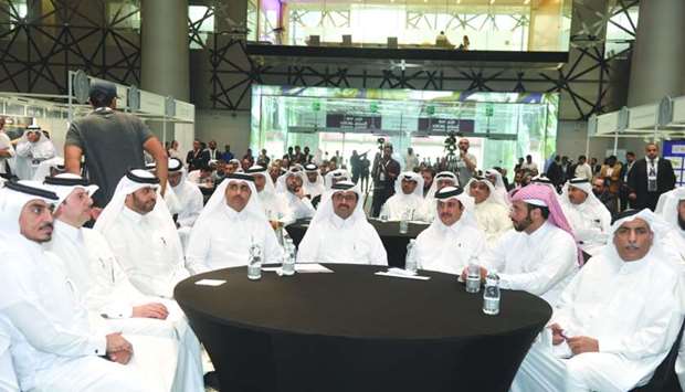 HE the Minister of Energy and Industry Dr Mohamed bin Saleh al-Sada (centre), with QDB CEO Abdul Aziz bin Nasser al-Khalifa (third left) and Kahramaa president Issa bin Hilal al-Kuwari (fourth left) at the event. PICTURE: Noushad Thekkayil
