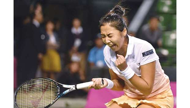 Zarina Diyas of Kazakhstan celebrates her win over Japanu2019s Miyu Kato in the final of the Japan Open tennis tournament in Tokyo. (AFP)