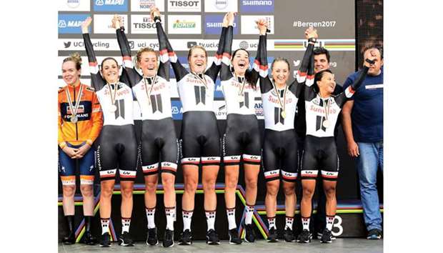 Sunweb team riders (from left) Lucinda Brand, Leah Kirchmann, Coryn Rivera, Ellen van Dijk, Floortje Mackaij and Sabrina Stultiens celebrate after winning the womenu2019s team time trial during the UCI Road World Championships in Bergen, Norway, yesterday. (AFP)