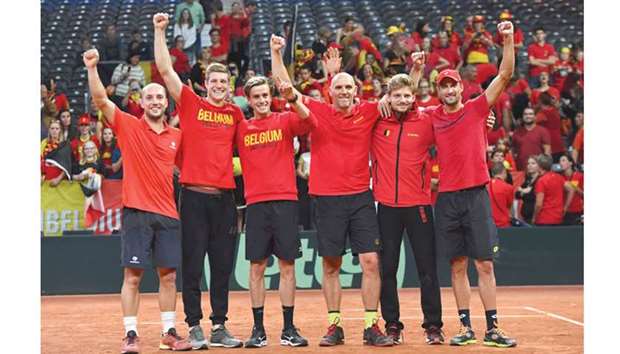 Belgiumu2019s Davis Cup team celebrate after winning the Davis Cup semi-final against Australia in Brussels yesterday. (AFP)