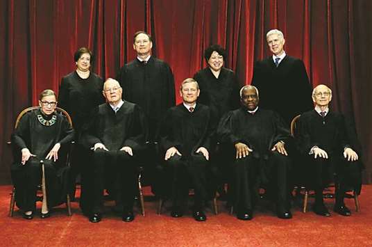 Supreme Court justices in a new family photo.