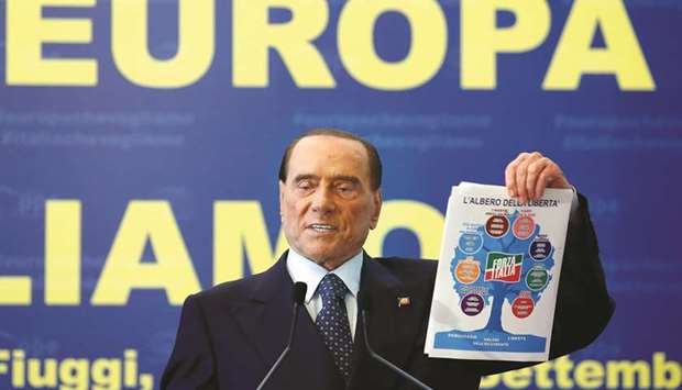 Forza Italia leader Silvio Berlusconi holds the party programme during European Peopleu2019s Party meeting in Fiuggi, Italy.