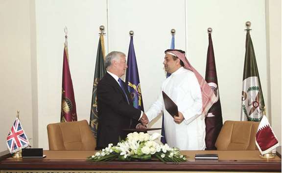 HE the Minister of State of Defence Affairs Dr Khalid bin Mohamed al-Attiyah and Britainu2019s Defence Secretary Michael Fallon shake hands after signing the deal.