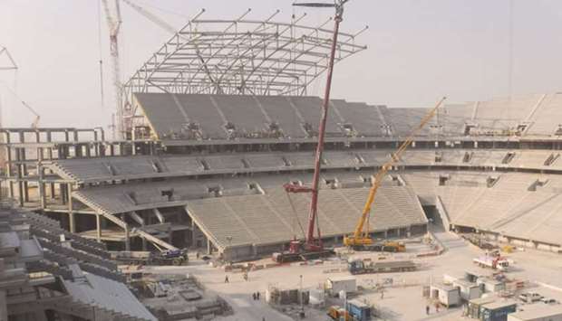 The Al Bayt Stadium now and below an artistu2019s impression of it when it will be completed.