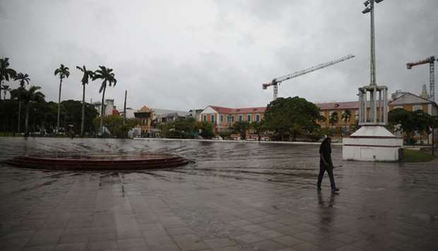 A man walks in a square as Hurricane Maria approaches in Pointe-a-Pitre, Guadeloupe island. Reuters