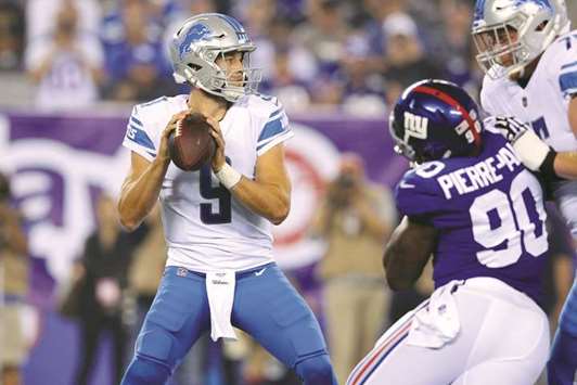 Detroit Lions quarterback Matthew Stafford (9) drops back to pass against the New York Giants during the first quarter at MetLife Stadium. PICTURE: Brad Penner u2013USA TODAY Sports