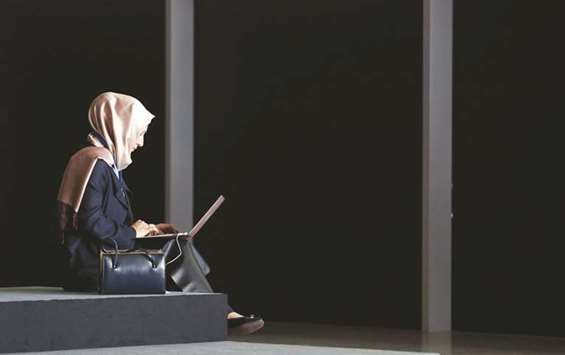 A delegate uses a laptop computer during the 9th World Islamic Economic Forum in London (file). The Brexit-driven banking exodus would highly likely also hit the Islamic finance sector in London, which is the largest globally in a non-Muslim jurisdiction.