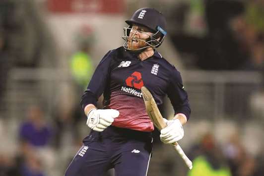 Englandu2019s Jonny Bairstow celebrates his century during the first one-day international match against West Indies at Old Trafford in Manchester yesterday. (Reuters)