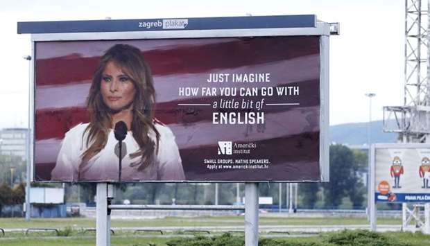 A billboard advertisement for the American Institute school in Zagreb featuring an image of the US First Lady Melania Trump with a caption that reads, ,Just imagine how far you can go with a little bit of English,, is pictured on September 19, 2017 in Zagreb.